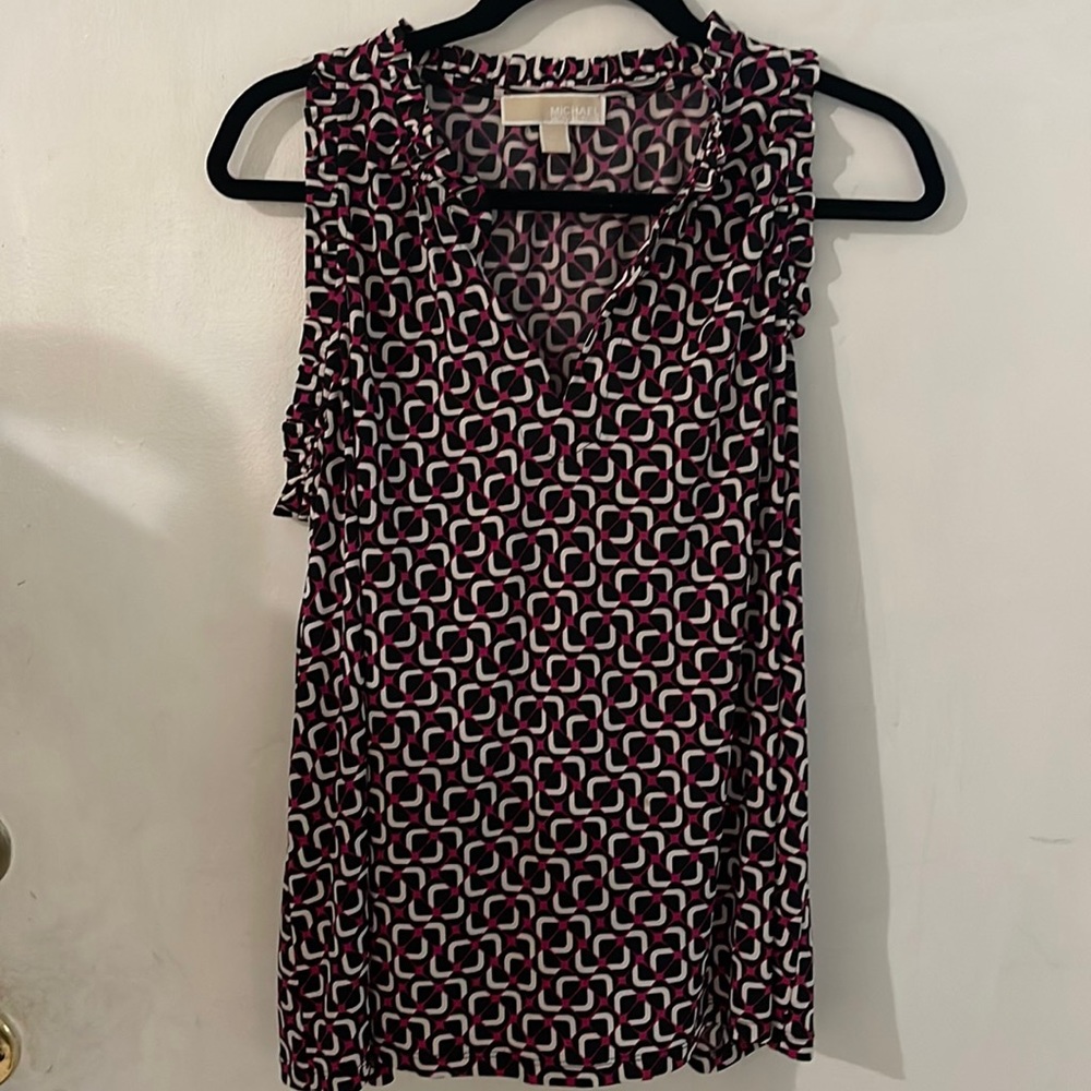 Michael Kors sleeveless top, size XL.  V-neck front. Black with white and pink
